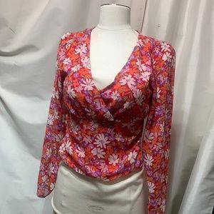 A floral long sleeve blouse.